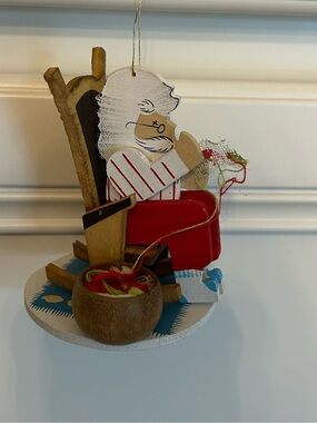 Vintage Emgee Hawaiian Santa Claus Knitting Christmas Tree Ornament
Wood
1983
